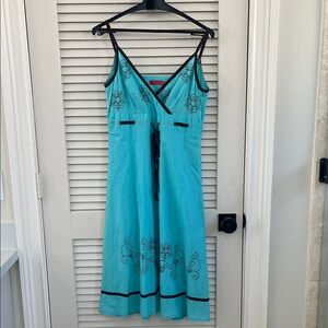 Blue Sleeveless Dress with Brown Floral Accents